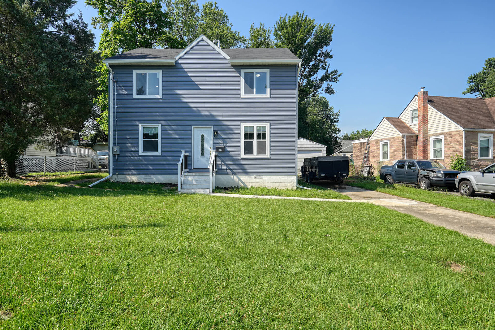 After — fully finished exterior following gut renovation and rebuild