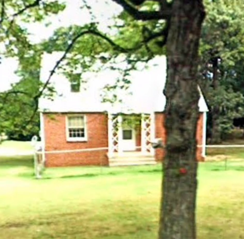 Before — single-story brick ranch home prior to second-floor addition